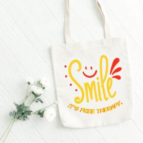 Smile Quote Canvas Tote Bag – “It’s Free Therapy” Motivational Eco-Friendly Shopping Bag